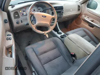 2002 Ford Explorer Sport Value z VIN 1FMYU60E62UC73005, wystawiony jako Copart lot #82278024 z przebiegiem 195 154 mil mil oraz Czysty tytuł • Clean title. Historia ofert i sprzedaży dostępna na DreamBid. Obrazek 8.