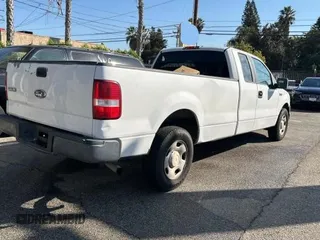 2008 Ford F-150 XL with VIN 1FTVX12578KD70345, listed as a Copart auction lot 79133324 with 122,847 mi miles and Clean title. Bid and sale history available at DreamBid. Image 4.