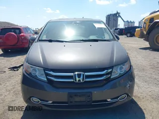 2014 Honda Odyssey Touring with VIN 5FNRL5H90EB082691, listed as a IAAI auction lot 42572977 with 54,413 mi miles and . Bid and sale history available at DreamBid. Image 12.