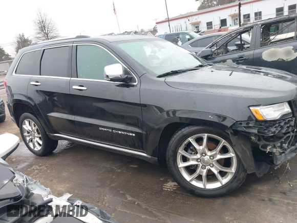 2015 Jeep Grand Cherokee Summit with VIN 1C4RJEJG3FC626002, listed as a IAAI auction lot 41295706 with 85,958 mi miles and . Bid and sale history available at DreamBid. Image 13.