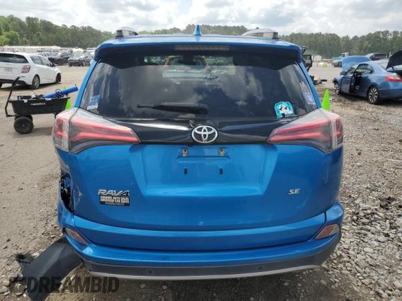 2017 Toyota RAV4 SE with VIN JTMNFREV3HJ713980, listed as a Copart auction lot 54337395 with 176,399 mi miles and Salvage title. Bid and sale history available at DreamBid. Image 6.