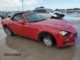 2017 FIAT 124 Spider Lusso z VIN JC1NFAEKXH0102435, wystawiony jako Copart lot #54235675 z przebiegiem 84 343 mil mil oraz Szkoda całkowita • Salvage title. Historia ofert i sprzedaży dostępna na DreamBid. Obrazek 4.