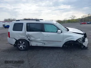 2014 Honda Pilot Touring with VIN 5FNYF4H97EB046879, listed as a IAAI auction lot 42017280 with 167,564 mi miles and . Bid and sale history available at carsss.com. Image 14.