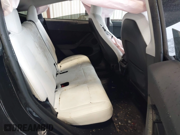 2023 Tesla Model Y Performance with VIN 7SAYGDEF2PF800641, listed as a IAAI auction lot 41612596 with 60,984 mi miles and . Bid and sale history available at DreamBid. Image 8.