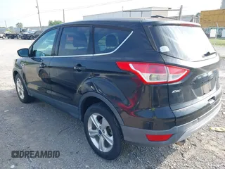 2013 Ford Escape SE with VIN 1FMCU0GX9DUD64514, listed as a IAAI auction lot 42120601 with 193,415 mi miles and . Bid and sale history available at carsss.com. Image 3.