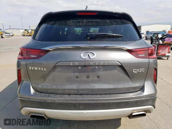 2023 Infiniti QX50 Luxe with VIN 3PCAJ5BA3PF105275, listed as a Copart auction lot 50584265 with 26,399 mi miles and Salvage title. Bid and sale history available at DreamBid. Image 6.