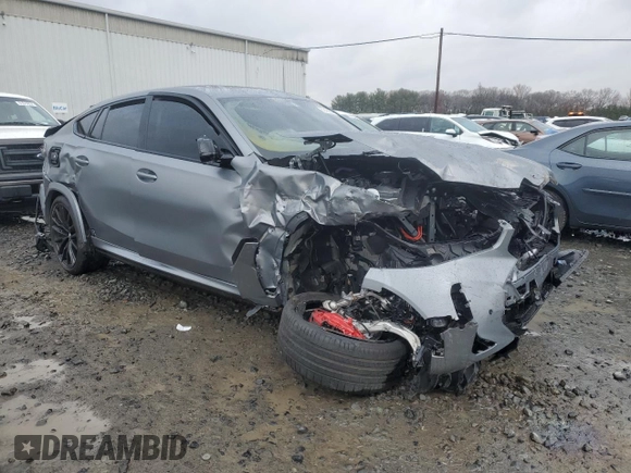2025 BMW X6 M60i with VIN 5UX43EX01S9X34140, listed as a Copart auction lot 82425694 with 6,844 mi miles and Salvage Title. Bid and sale history available at carsss.com. Image 4.