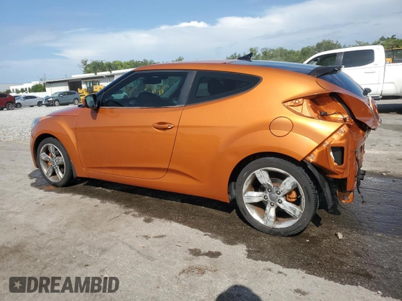 2013 Hyundai Veloster w/Gray Int z VIN KMHTC6AD1DU103219, wystawiony jako Copart lot #60426875 z przebiegiem 135 869 mil mil oraz Szkoda całkowita • Salvage title. Historia ofert i sprzedaży dostępna na DreamBid. Obrazek 2.