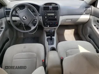 2006 Kia Spectra EX z VIN KNAFE121565370909, wystawiony jako Copart lot #56572995 z przebiegiem 102 978 mil mil oraz Szkoda całkowita • Salvage title. Historia ofert i sprzedaży dostępna na DreamBid. Obrazek 8.