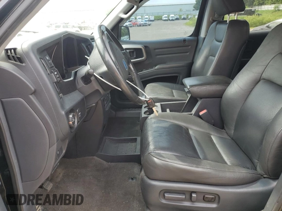 2010 Honda Ridgeline RTL with VIN 5FPYK1F5XAB014004, listed as a Copart auction lot 62848595 with 131,920 mi miles and Clean title. Bid and sale history available at DreamBid. Image 7.