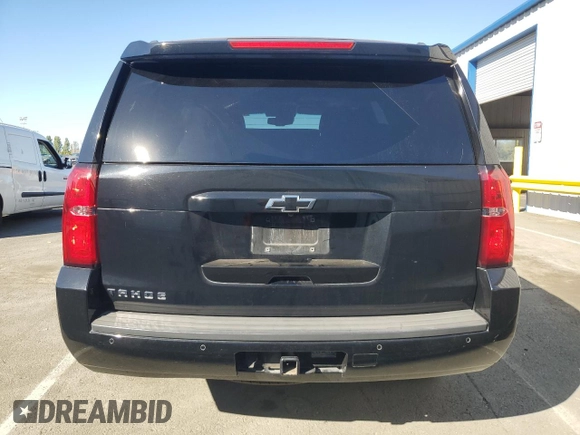 2017 Chevrolet Tahoe LT with VIN 1GNSKBKC3HR322636, listed as a Copart auction lot 60458095 with 140,283 mi miles and Salvage title. Bid and sale history available at DreamBid. Image 6.