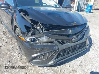 2022 Toyota Camry SE z VIN 4T1G11AK4NU040899, wystawiony jako IAAI lot #41736850 z przebiegiem 64 183 mil mil oraz . Historia ofert i sprzedaży dostępna na DreamBid. Obrazek 6.