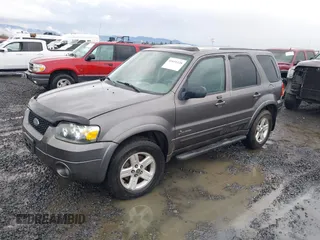 2006 Ford Escape Hybrid with VIN 1FMCU96H76KA30866, listed as a IAAI auction lot 41651128 with 177,908 mi miles and . Bid and sale history available at DreamBid. Image 2.