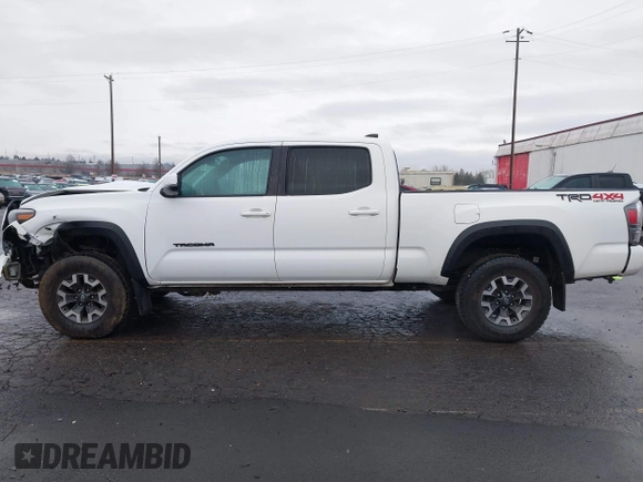 2021 Toyota Tacoma SR5 with VIN 3TMDZ5BN1MM100575, listed as a IAAI auction lot 41516274 with 61,974 mi miles and . Bid and sale history available at DreamBid. Image 15.