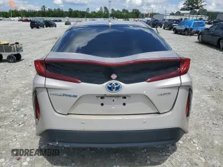 2021 Toyota Prius LE with VIN JTDKAMFPXM3184126, listed as a Copart auction lot 56857675 with 54,676 mi miles and Clean Title. Bid and sale history available at DreamBid. Image 6.