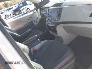 2014 Toyota Sienna SE with VIN 5TDXK3DC4ES487772, listed as a IAAI auction lot 41218295 with 153,368 mi miles and . Bid and sale history available at DreamBid. Image 5.