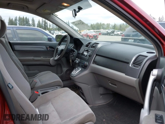 2007 Honda CR-V EX with VIN JHLRE38557C001330, listed as a IAAI auction lot 42136936 with 251,223 mi miles and . Bid and sale history available at carsss.com. Image 5.