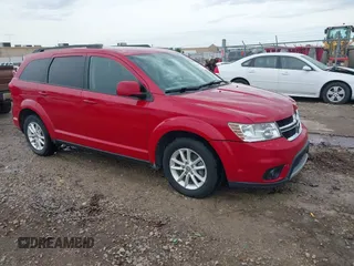 2015 Dodge Journey SXT with VIN 3C4PDCBG3FT628015, listed as a IAAI auction lot 42161524 with 180,358 mi miles and . Bid and sale history available at DreamBid. Image 1.