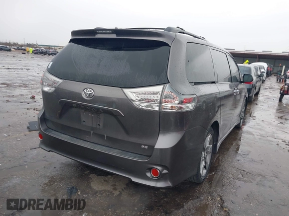 2014 Toyota Sienna SE with VIN 5TDXK3DC4ES434604, listed as a IAAI auction lot 41346434 with 108,633 mi miles and . Bid and sale history available at DreamBid. Image 4.