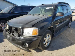 2004 GMC Envoy SLT with VIN 1GKET16S746183917, listed as a Copart auction lot 83373294 with 218,895 mi miles and Salvage Title. Bid and sale history available at DreamBid. Image 1.