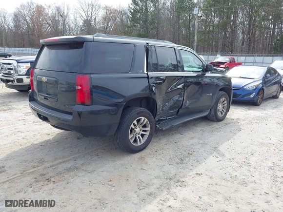 2016 Chevrolet Tahoe LT with VIN 1GNSCBKCXGR100381, listed as a IAAI auction lot 41542315 with 228,506 mi miles. Bid and sale history available at carsss.com. Image 4.