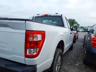 2021 Ford F-150 XL with VIN 1FTMF1CB5MKE25341, listed as a IAAI auction lot 42103478 with 125,369 mi miles and . Bid and sale history available at DreamBid. Image 4.