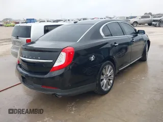 2013 Lincoln MKS EcoBoost with VIN 1LNHL9FT2DG604724, listed as a IAAI auction lot 41428420 with 152,880 mi miles and . Bid and sale history available at DreamBid. Image 4.
