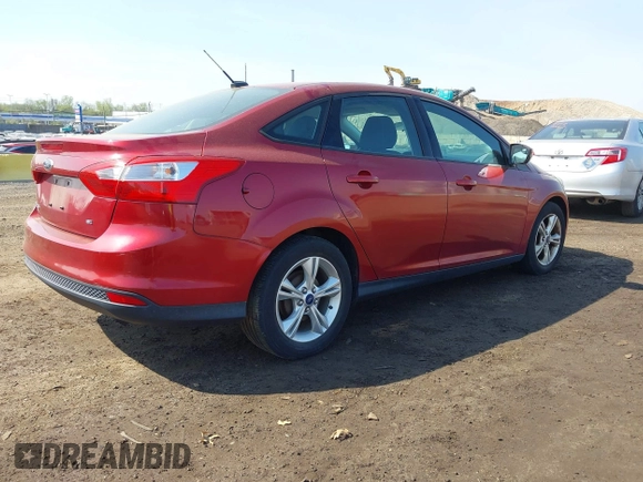 2014 Ford Focus SE with VIN 1FADP3F27EL312349, listed as a IAAI auction lot 42121230 with 80,737 mi miles and . Bid and sale history available at DreamBid. Image 4.