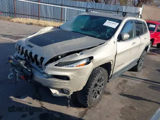 2015 Jeep Cherokee Latitude with VIN 1C4PJMCS4FW578401, listed as a IAAI auction lot 41014082 with 127,465 mi miles. Bid and sale history available at carsss.com. Image 17.
