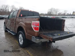 2011 Ford F-150 XLT with VIN 1FTFW1ET7BKD43896, listed as a IAAI auction lot 41709050 with 228,834 mi miles. Bid and sale history available at carsss.com. Image 3.