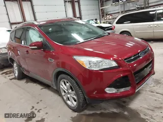 2014 Ford Escape Titanium with VIN 1FMCU9J9XEUA51732, listed as a IAAI auction lot 41542867 with 44,141 mi miles. Bid and sale history available at carsss.com. Image 1.