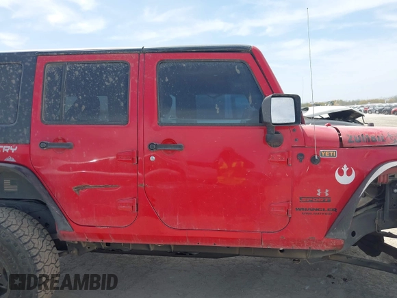 2015 Jeep Wrangler Unlimited Willys Wheeler with VIN 1C4BJWDG9FL750505, listed as a IAAI auction lot 41781762 with 139,000 mi miles and . Bid and sale history available at DreamBid. Image 14.