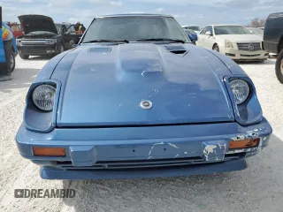 1982 Datsun 280ZX z VIN JN1HZ04S5CX457910, wystawiony jako Copart lot #77132604 z przebiegiem 261 383 mil mil oraz Szkody całkowita. Historia ofert i sprzedaży dostępna na DreamBid. Obrazek 5.
