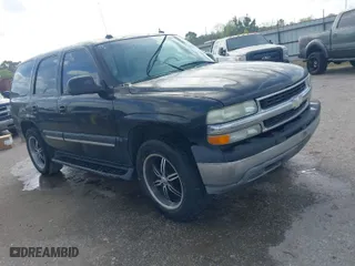 2004 Chevrolet Tahoe LT with VIN 1GNEC13Z74J323109, listed as a IAAI auction lot 41829422 with 261,636 mi miles. Bid and sale history available at carsss.com. Image 1.