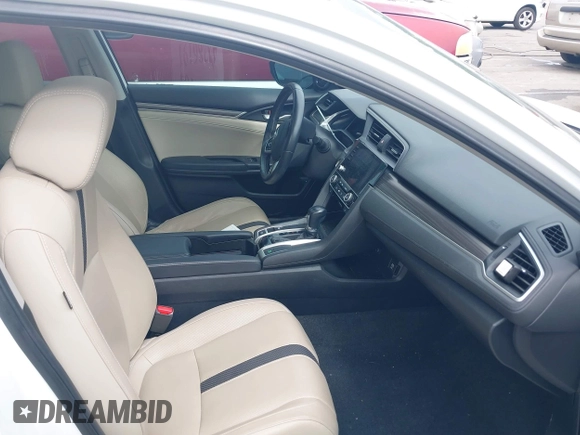 2020 Honda Civic EX-L z VIN 19XFC1F74LE015155, wystawiony jako IAAI lot #42286191 z przebiegiem 73 146 mil mil oraz . Historia ofert i sprzedaży dostępna na DreamBid. Obrazek 5.
