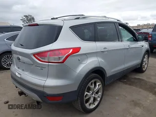 2013 Ford Escape Titanium с VIN 1FMCU9J91DUA13353, выставлен на аукционе IAAI как лот 42074045 с пробегом 108 452 миль миль и . История ставок и продаж доступна на DreamBid. Изображение 4.