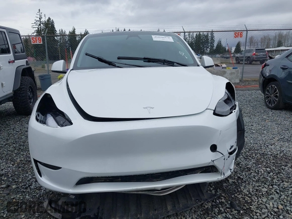 2023 Tesla Model Y Long Range with VIN 7SAYGDEE7PF809164, listed as a IAAI auction lot 41828974 with 31,772 mi miles. Bid and sale history available at carsss.com. Image 12.