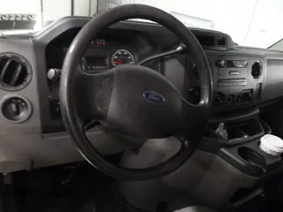 2010 Ford Econoline Cargo Commercial with VIN 1FTNE2EL7ADA74497, listed as a IAAI auction lot 42734704 with 93,387 mi miles and . Bid and sale history available at DreamBid. Image 1.