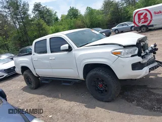 2021 Toyota Tacoma 4WD SR with VIN 3TMCZ5AN2MM414975, listed as a IAAI auction lot 41997227 with 57,729 mi miles. Bid and sale history available at carsss.com. Image 13.