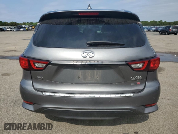 2020 Infiniti QX60 Luxe с VIN 5N1DL0MM1LC527839, выставлен на аукционе Copart как лот 62275995 с пробегом 89 188 миль миль и Списание • Salvage title. История ставок и продаж доступна на DreamBid. Изображение 6.