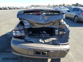 2001 Chevrolet Malibu LS with VIN 1G1NE52J516237620, listed as a Copart auction lot 76809764 with 82,099 mi miles and Salvage Title. Bid and sale history available at carsss.com. Image 6.