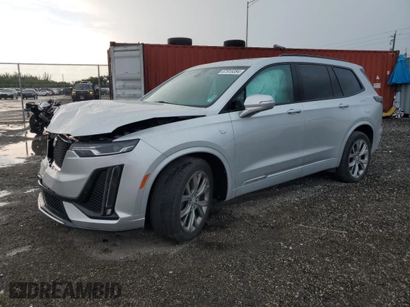 2020 Cadillac XT6 AWD Sport with VIN 1GYKPGRSXLZ217891, listed as a Copart auction lot 67915354 with 34,143 mi miles and Salvage Title. Bid and sale history available at carsss.com. Image 1.