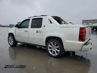 2013 Chevrolet Avalanche LTZ with VIN 3GNMCGE0XDG334846, listed as a Copart auction lot 55261885 with 118,704 mi miles and Salvage title. Bid and sale history available at DreamBid. Image 2.
