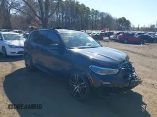 2019 BMW X5 xDrive50i with VIN 5UXJU2C59KLN64337, listed as a IAAI auction lot 41757540 with 103,242 mi miles. Bid and sale history available at carsss.com. Image 1.
