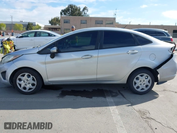 2012 Ford Fiesta SE with VIN 3FADP4BJ2CM150953, listed as a IAAI auction lot 42010904 with 77,637 mi miles. Bid and sale history available at carsss.com. Image 14.