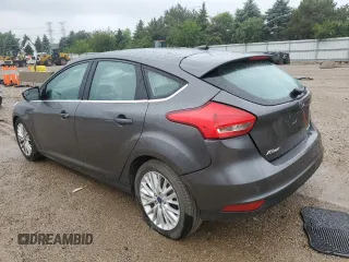 2018 Ford Focus Titanium z VIN 1FADP3N21JL295883, wystawiony jako Copart lot #59051015 z przebiegiem 43 284 mil mil oraz Szkoda całkowita • Salvage title. Historia ofert i sprzedaży dostępna na DreamBid. Obrazek 2.