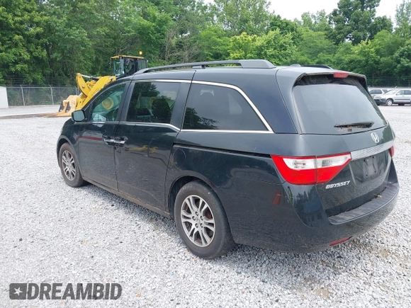 2012 Honda Odyssey EX-L with VIN 5FNRL5H66CB095996, listed as a IAAI auction lot 42446499 with 198,016 mi miles and . Bid and sale history available at DreamBid. Image 3.