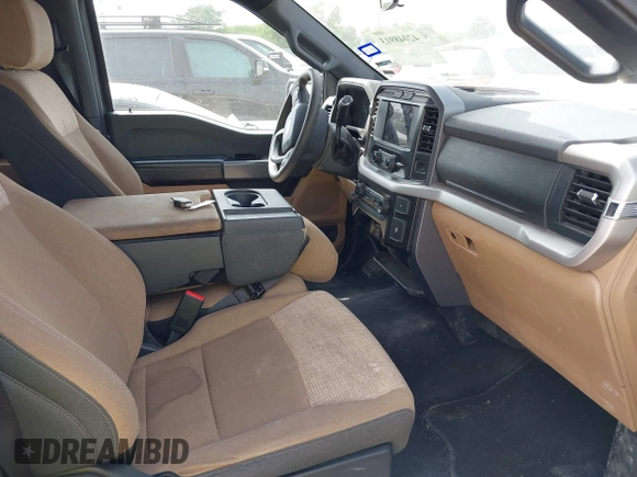 2023 Ford F-150 XL with VIN 1FTFW1E87PKF04735, listed as a IAAI auction lot 42048913 with 54,893 mi miles. Bid and sale history available at carsss.com. Image 5.