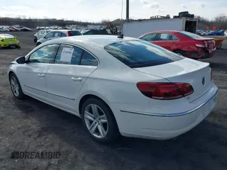 2013 Volkswagen CC Sport with VIN WVWBN7AN9DE516590, listed as a IAAI auction lot 41684586 with 153,312 mi miles. Bid and sale history available at carsss.com. Image 3.