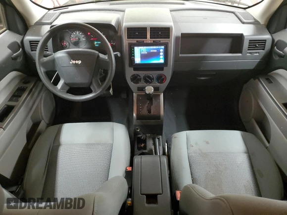2007 Jeep Patriot Sport with VIN 1J8FT28W67D358205, listed as a Copart auction lot 52323215 with 133,212 mi miles and Salvage Title. Bid and sale history available at DreamBid. Image 8.